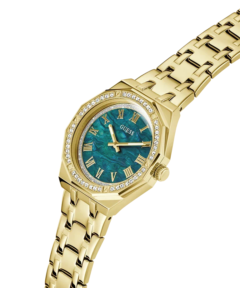 Angled view of GUESS gold tone watch with blue Roman numeral dial and crystal-adorned bezel