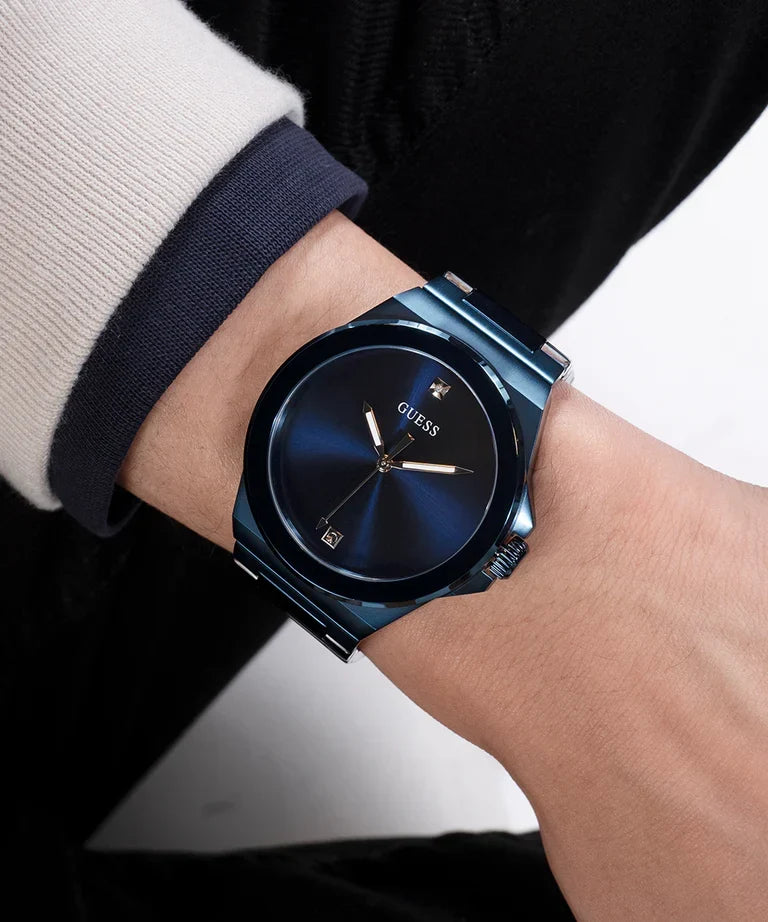 GUESS GW0833G1 men's watch on wrist showing blue case and dial design