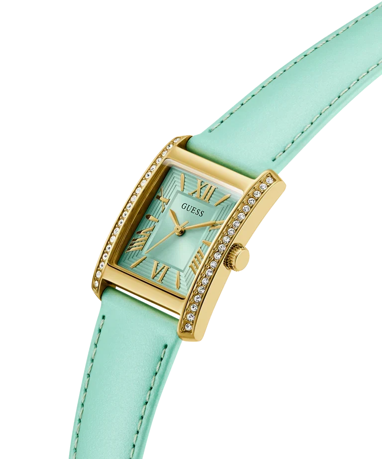 GUESS GW0875L1 angled view showing light blue dial with Roman numerals and mint green leather strap
